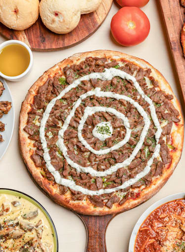 Monica's pizza top